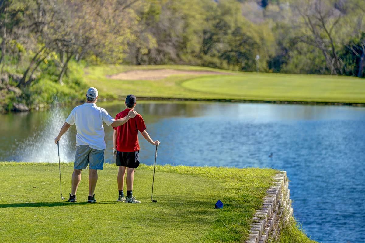 Father and son on the golf course