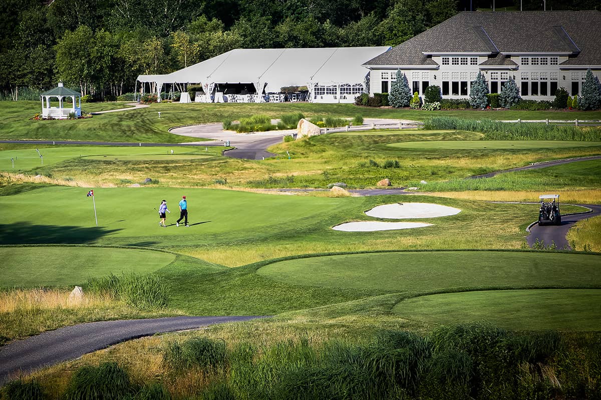 Golfers walking on a course